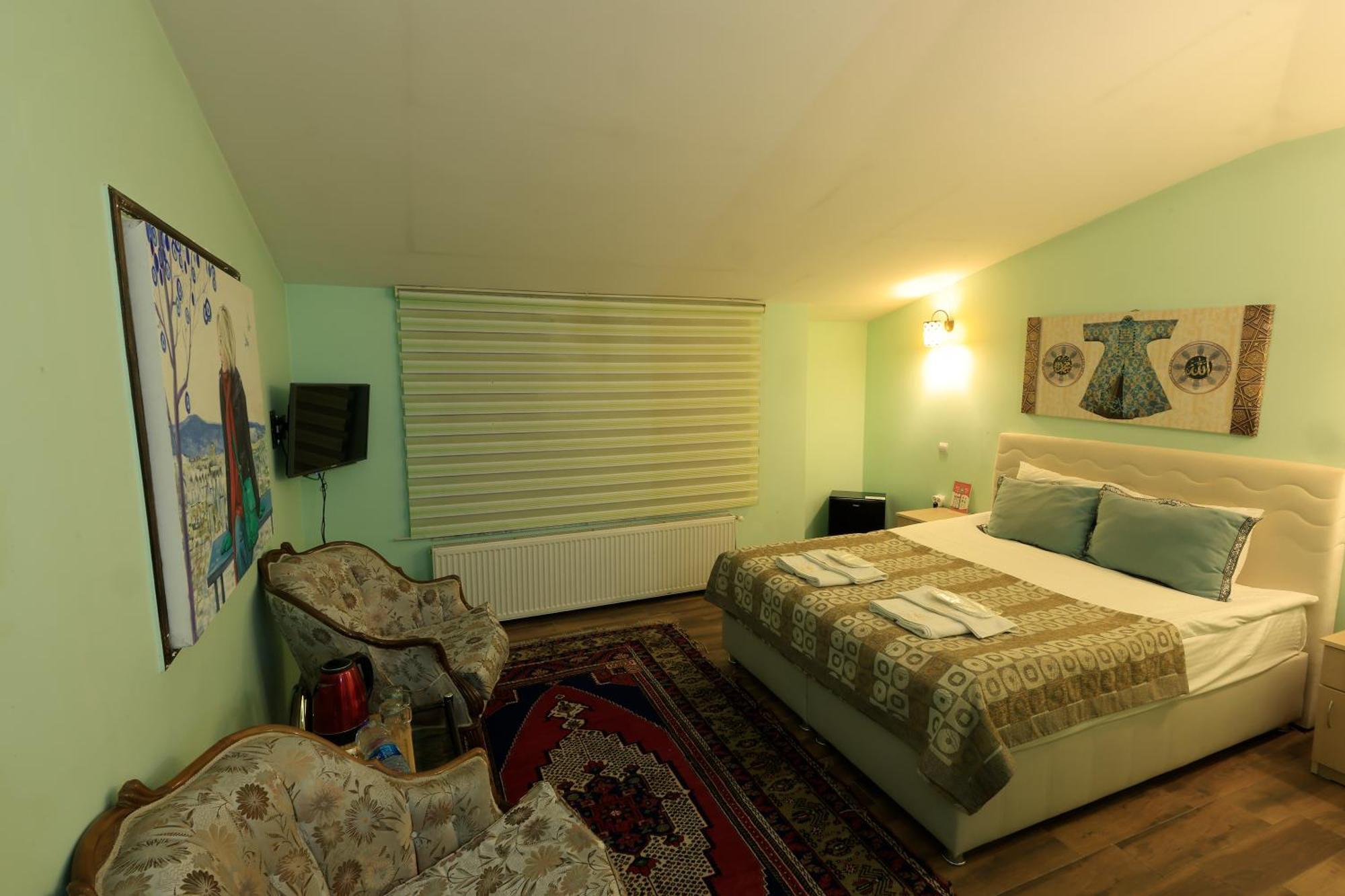 Kemal Stone House Hotel. Гостьовий будинок Учгісар